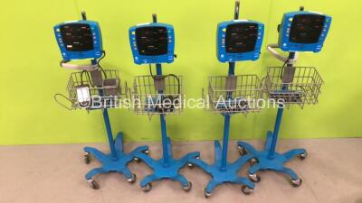 4 x GE Carescape V100 Dinamap Monitors with Power Supplies on Stands (All Power Up) *SDT08370044SP / SDT08150032SP*