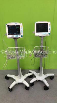 2 x Datex Ohmeda S/5 FM Patient Monitors on Stands with 2 x E-PSM-00 Modules and Various Leads (Both Power Up with 1 x Blank Screen and Some Missing Casing - See Photo) *6092010 / 6092004*