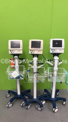 3 x Fukuda Denshi DS-7100 Patient Monitors on Stands with 1 x BP Hose,2 x SpO2 Finger Sensors and 1 x BP Cuff (1 x Powers Up, 1 x Powers Up with Touch Screen Not Working,1 x Powers Up with Blank Screen)