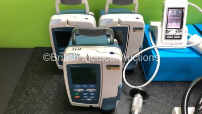 Mixed Lot Including 3 x Cardinal Health Alaris GP Infusion Pumps, 3 x Vitalograph 2120 Handheld Spirometers with 2 x Power Supplies, Docking Stations and Accessories (All Power Up) 2 x Alaris SE Pumps, 1 x Bird Mark 7A Respirator, 1 x DeSoutter Cast Cutte - 4