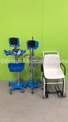 Mixed Lot Including 2 x GE Carescape V100 Patient Monitors on Stands with 2 x BP Hoses and 2 x SpO2 Finger Sensors (Both Power Up) and 1 x Seca Seated Weighing Scales