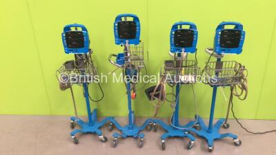 4 x GE Dinamap Procare Auscultatory Vital Signs Monitors on Stands with BP Hoses (All Powers Up) *S/N AAW07450589SA / AAW07450685SA / AAW07460172SA / AAW07460059SA*