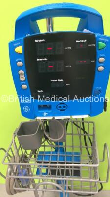 4 x GE Dinamap Procare Auscultatory Vital Signs Monitors on Stands with BP Hoses (All Powers Up) *S/N AAW07450589SA / AAW07450685SA / AAW07460172SA / AAW07460059SA* - 2