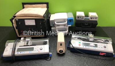 Mixed Lot Including 2 x IVAC PCAM Syringe Pumps (1 x Crack in Casing - See Photos) 2 x Atmos Atmoport N Suction Units (1 x Missing Cup) 1 x S.E. Thames Surgical Diathermy Power Meter, 1 x Welch Allyn 49501 Light Source (Powers Up) 2 x Wescor 3700 Webster 