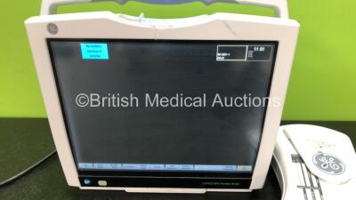 GE B450 Carescape Patient Monitor *Mfd 2015* (Powers Up with Damaged Casing, Missing Light Cover - See Photos) Including 1 x GE 2016793-002 Patient Data Module with ECG, Temp/CO, P1/P3, P2/P4, SpO2 and NIBP Options *Mfd 2013* (Missing Battery Cover - See - 2