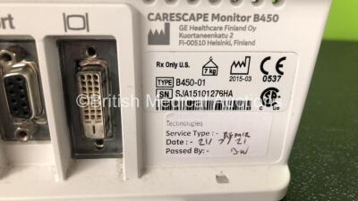 GE B450 Carescape Patient Monitor *Mfd 2015* (Powers Up with Damaged Casing, Missing Light Cover - See Photos) Including 1 x GE 2016793-002 Patient Data Module with ECG, Temp/CO, P1/P3, P2/P4, SpO2 and NIBP Options *Mfd 2013* (Missing Battery Cover - See - 5