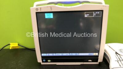 GE B450 Carescape Patient Monitor *Mfd 2015* (Powers Up with Damaged Casing, Missing Light Cover - See Photos) Including 1 x GE 2016793-002 Patient Data Module with ECG, Temp/CO, P1/P3, P2/P4, SpO2 and NIBP Options *Mfd 2013* - 2