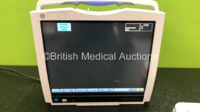 GE B450 Carescape Patient Monitor *Mfd 2015* (Powers Up with Damaged Casing, Missing Light Cover - See Photos) Including 1 x GE 2016793-002 Patient Data Module with ECG, Temp/CO, P1/P3, P2/P4, SpO2 and NIBP Options *Mfd 2015* (Missing Battery Cover - See - 2