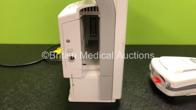 GE B450 Carescape Patient Monitor *Mfd 2015* (Powers Up with Damaged Casing, Missing Light Cover - See Photos) Including 1 x GE 2016793-002 Patient Data Module with ECG, Temp/CO, P1/P3, P2/P4, SpO2 and NIBP Options *Mfd 2015* (Missing Battery Cover - See - 3