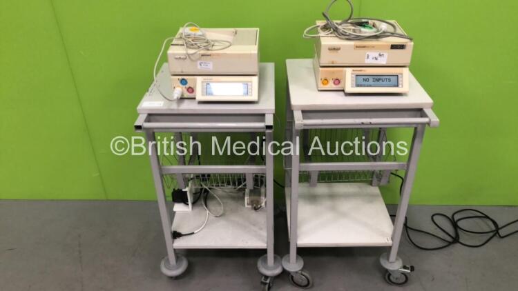 1 x Sonicaid Team Duo Fetal Monitor on Stand with 1 x Transducer and 1 x Sonicaid Team Fetal Monitor on Stand with 1 x Transducer (Both Power Up)