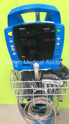 1 x GE Dinamap ProCare 300 Vital Signs Monitor on Stand with BP Hose (Missing 1 x Button) and 1 x GE Dinamap ProCare Auscultatory 300 Vital Signs Monitor on Stand with SPO2 Finger Sensor and BP Hose (1 x Powers Up) *S/N AAW05290261SA* - 2