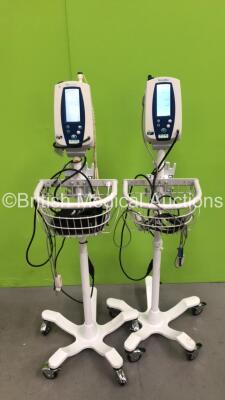 2 x Welch Allyn SPOT Vital Signs Monitors on Stands with SPO2 Finger Sensors and BP Hoses (Both Power Up) *S/N 21201703700 / 201410836*