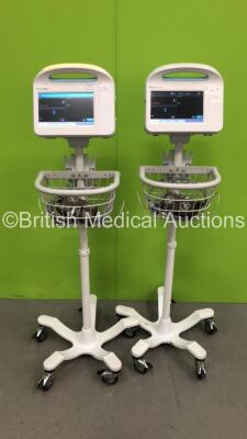 2 x Welch Allyn 6000 Series Patient Monitors on Stands with BP Cuffs (Both Power Up)