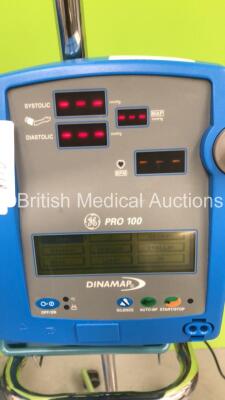 2 x GE Dinamap Pro 300V2 Vital Signs Monitor on Stands with SPO2 Finger Sensors and BP Hoses, 1 x GE Dinamap Pro 300V2 Vital Signs Monitor on Stand with SPO2 Finger Sensor and BP Hoses and 1 x GE Dinamap Critikon Pro 300 Vital Signs Monitor on Stand (All - 3