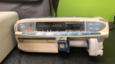 Mixed Lot Including 1 x Cardinal Health Alaris CC Syringe Pump (Powers Up , Requires Service) 1 x B & D Nippy Junior + in Carry Case (Powers Up) 3 x GE Trusat Oximeters with 3 x Power Supplies, 1 x Inditherm Alpha Mattress Pump and 1 x Baxter Colleague Pu - 3