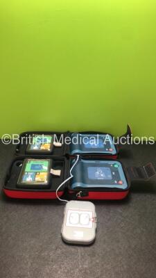 2 x Philips Heartstart FRx Defibrillators with 1 x Philips Heartstart Smart Pads II In Carry Cases (Both Power Up with Stock Battery, Batteries Not Included - 1 x in English / 1 x in Finish)