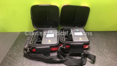 2 x Philips Heartstart FR3 Defibrillators with 2 x Batteries in Carry Cases (Both Power Up) *SN C12F00067, C12F00605