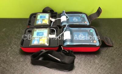 2 x Philips Heartstart FRx Defibrillators with 2 x Batteries and 2 x Philips Heartstart Smart Pads II In Carry Cases (Both Power Up)