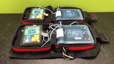 2 x Philips Heartstart FRx Defibrillators with 2 x Batteries and 2 x Philips Heartstart Smart Pads II In Carry Cases (Both Power Up)