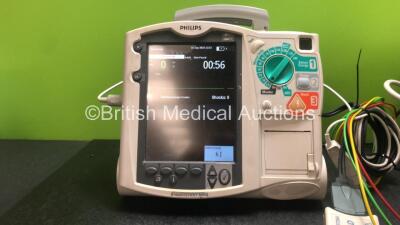 2 x Philips Heartstart MRx Defibrillators Including Pacer, ECG and Printer Options with 2 x Philips M3539A Modules, 2 x Philips M3538A Batteries, 2 x Paddle Leads, 2 x Philips M3725A 50 Ohm Test Loads and 2 x 3 Lead ECG Leads (Both Power Up) *SN US0031532 - 2