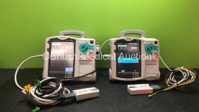 2 x Philips Heartstart MRx Defibrillators Including ECG and Printer Options with 2 x Philips M3539A Modules, 2 x Philips M3538A Batteries, 2 x Paddle Leads, 2 x Philips M3725A 50 Ohm Test Loads and 2 x 3 Lead ECG Leads (Both Power Up) *SNUS00315336, US003