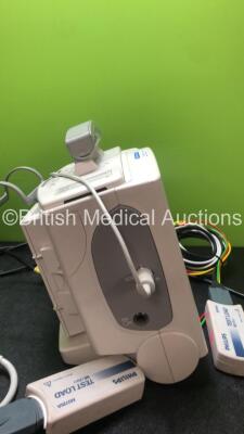 2 x Philips Heartstart MRx Defibrillators Including ECG and Printer Options with 2 x Philips M3539A Modules, 2 x Philips M3538A Batteries, 2 x Paddle Leads, 2 x Philips M3725A 50 Ohm Test Loads and 2 x 3 Lead ECG Leads (Both Power Up) *SNUS00315336, US003 - 5