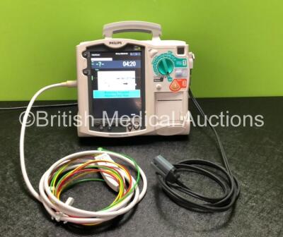 Philips Heartstart MRx Defibrillator Including ECG, Pacer and Printer Options with 1 x Philips M3539A Module, 1 x Philips M3538A Battery, 1 x Paddle Lead and 1 x 3 Lead ECG Lead (Powers Up) *SN US00318??4*