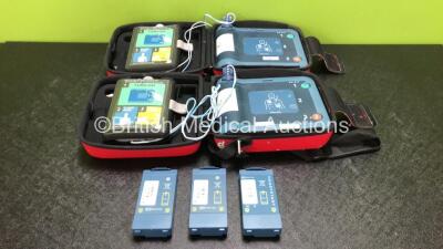 2 x Philips Heartstart FRx Defibrillators with 5 x Batteries and 4 x Philips Heartstart Smart Pads II In Carry Cases (Both Power Up)