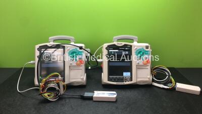 2 x Philips Heartstart MRx Defibrillators Including ECG and Printer Options with 2 x Philips M3539A Modules, 2 x Philips M3538A Batteries, 2 x Paddle Leads, 1 x Philips M3725A 50 Ohm Test Load and 2 x 3 Lead ECG Leads (Both Power Up) *SN US003135377, US00