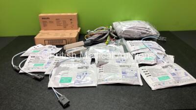 Mixed Lot Including Philips 40457C Thermal Printing Papers,Various Patient Monitoring Cables Including Paddle Leads and ECG Leads, 2 x Philips M3725A Test Loads and Approximately 20 x Skintact Defibrillator Pads