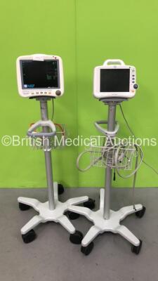 1 x GE Dash 4000 (Powers Up) and 1 x GE Dash 3000 (Powers Up with Blank Screen) Patient Monitors on Stands