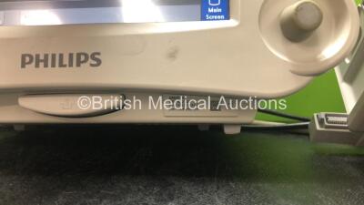 Job Lot Including 1 x Philips IntelliVue MP70 Touch Screen Patient Monitor (Powers Up) 1 x Philips IntelliVue MP20 Patient Monitor (Powers Up) and 2 x Philips M8048A Module Racks - 5