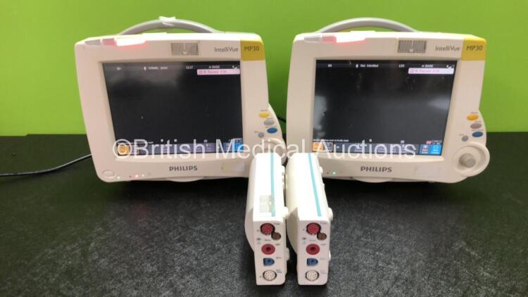 2 x Philips IntelliVue MP30 Patient Monitors (Both Power Up with Slight Damage to Screens and Damage to Casing - See Photos) with 2 x Philips M3001A Modules Including Press, Temp, NBP, SpO2 and ECG/Resp Options