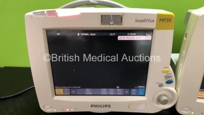 2 x Philips IntelliVue MP30 Patient Monitors (Both Power Up with Slight Damage to Screens and Damage to Casing - See Photos) with 2 x Philips M3001A Modules Including Press, Temp, NBP, SpO2 and ECG/Resp Options - 2