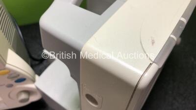 2 x Philips IntelliVue MP30 Patient Monitors (Both Power Up with Slight Damage to Screens and Damage to Casing - See Photos) with 2 x Philips M3001A Modules Including Press, Temp, NBP, SpO2 and ECG/Resp Options - 5