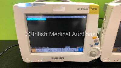 2 x Philips IntelliVue MP30 Patient Monitors Including Printer Options (Both Power Up, 1 x Damage to Casing - See Photos) with 2 x Philips M3001A Modules Including Press, Temp, NBP, SpO2 and ECG/Resp Options (1 x Crack in Casing - See Photos) - 2