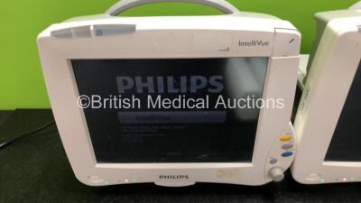 2 x Philips IntelliVue MP50 Patient Monitors (Both Power Up, 1 x Missing Dial and 1 x Missing Badge - See Photos) with 2 x Philips M3001A Modules Including Press, Temp, NBP, SpO2 and ECG/Resp Options - 2