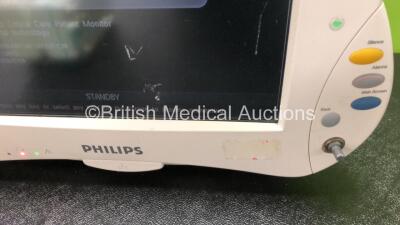 2 x Philips IntelliVue MP50 Patient Monitors (Both Power Up, 1 x Missing Dial and 1 x Missing Badge - See Photos) with 2 x Philips M3001A Modules Including Press, Temp, NBP, SpO2 and ECG/Resp Options - 5