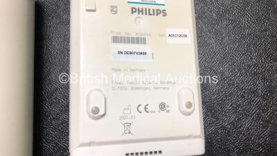 2 x Philips IntelliVue MP50 Patient Monitors (Both Power Up, 1 x Missing Dial and 1 x Missing Badge - See Photos) with 2 x Philips M3001A Modules Including Press, Temp, NBP, SpO2 and ECG/Resp Options - 8