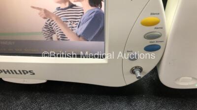 2 x Philips IntelliVue MP50 Patient Monitors (Both Power Up, 1 x Missing Dial and 1 x Damage to Casing and Damaged / Missing Dial - See Photos) with 2 x Philips M3001A Modules Including Press, Temp, NBP, SpO2 and ECG/Resp Options - 3