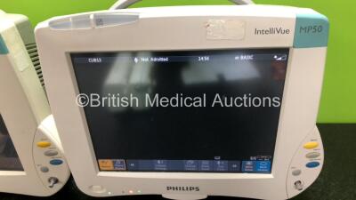 2 x Philips IntelliVue MP50 Patient Monitors (Both Power Up, 1 x Missing Dial and 1 x Damage to Casing and Damaged / Missing Dial - See Photos) with 2 x Philips M3001A Modules Including Press, Temp, NBP, SpO2 and ECG/Resp Options - 4