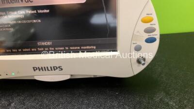 2 x Philips IntelliVue MP50 Patient Monitors (Both Power Up, 1 x Missing Dial and Damage to Casing / Module Clip - See Photos) with 1 x Philips M3015A Module Including Press, Temp and CO2 Microstream Options (Damaged Connection - See Photos) - 4