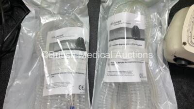 Job Lot Including 11 x ResMed S9 CPAP Units with 10 x Power Supplies (All Power Up, 1 x Crack in Casing - See Photos) 2 x ResMed H5i Humidifier Units, 1 x ResMed S8 Autoset Spirit II CPAP (Damaged Casing - See Photos) and 2 x WILAmed Breathing Tubes - 9