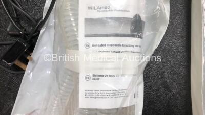 Job Lot Including 11 x ResMed S9 CPAP Units with 10 x Power Supplies (All Power Up, 1 x Crack in Casing - See Photos) 2 x ResMed H5i Humidifier Units, 1 x ResMed S8 Autoset Spirit II CPAP (Damaged Casing - See Photos) and 2 x WILAmed Breathing Tubes - 10