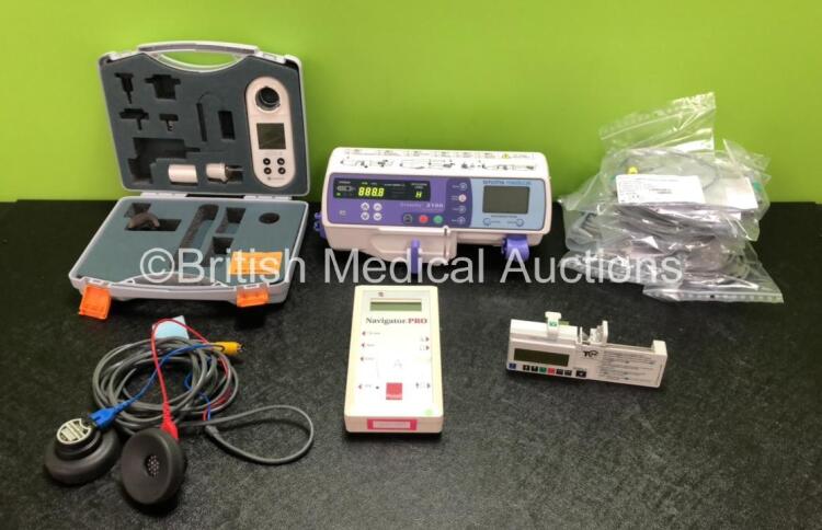 Mixed Lot Including 1 x Smiths Medical Graseby 2100 Syringe Pump *Mfd 2020* (Powers Up) 1 x CareFusion Micro I Spirometer in Case, 1 x Pair of Telephonics Audiometry Headphones, 1 x Natus Navigator Pro Unit, 1 x CME Medical T34 Ambulatory Syringe Pump and