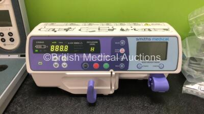 Mixed Lot Including 1 x Smiths Medical Graseby 2100 Syringe Pump *Mfd 2020* (Powers Up) 1 x CareFusion Micro I Spirometer in Case, 1 x Pair of Telephonics Audiometry Headphones, 1 x Natus Navigator Pro Unit, 1 x CME Medical T34 Ambulatory Syringe Pump and - 2