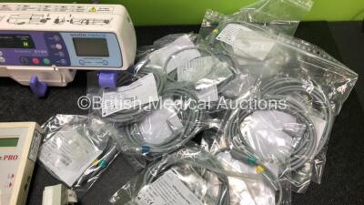 Mixed Lot Including 1 x Smiths Medical Graseby 2100 Syringe Pump *Mfd 2020* (Powers Up) 1 x CareFusion Micro I Spirometer in Case, 1 x Pair of Telephonics Audiometry Headphones, 1 x Natus Navigator Pro Unit, 1 x CME Medical T34 Ambulatory Syringe Pump and - 6