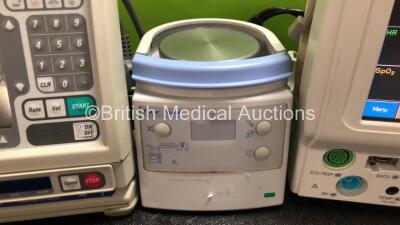 Mixed Lot Including 1 x Fisher&Paykel MR850AEK Respiratory Humidifier (No Power) 1 x Fukuda Denshi DS-1700 Patient Monitors Including ECG/Resp, SpO2, NIBP, BP, Temp and Printer Options (Powers Up) and 3 x Baxter Colleague Pumps *SN 21120630DL / 21120491DL - 4