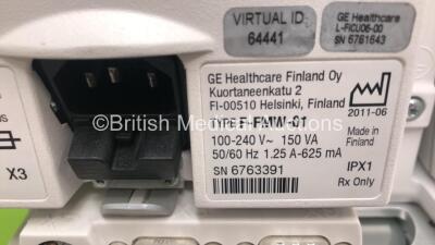 2 x Datex-Ohmeda S5 Patient Monitors on Stands with 1 x GE E-PSM-00 Multi Parameter Module with NBP / T1-2 / SPO2 and ECG Options and 1 x GE E-PSMP-00 Multiparameter Module with NIBP / P1-P2 /T1-2 / SPO2 and ECG Options (Both Power Up) *S/N 6763391 / 6463 - 7