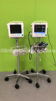 2 x Datex-Ohmeda S/5 Patient Monitors on Stands with 1 x M-NESTPR Multiparameter Module with Selection of Cables (Both Power Up)